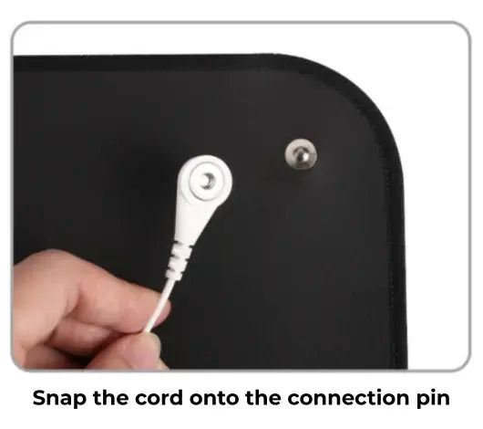 Snap the cord onto the connection pin.